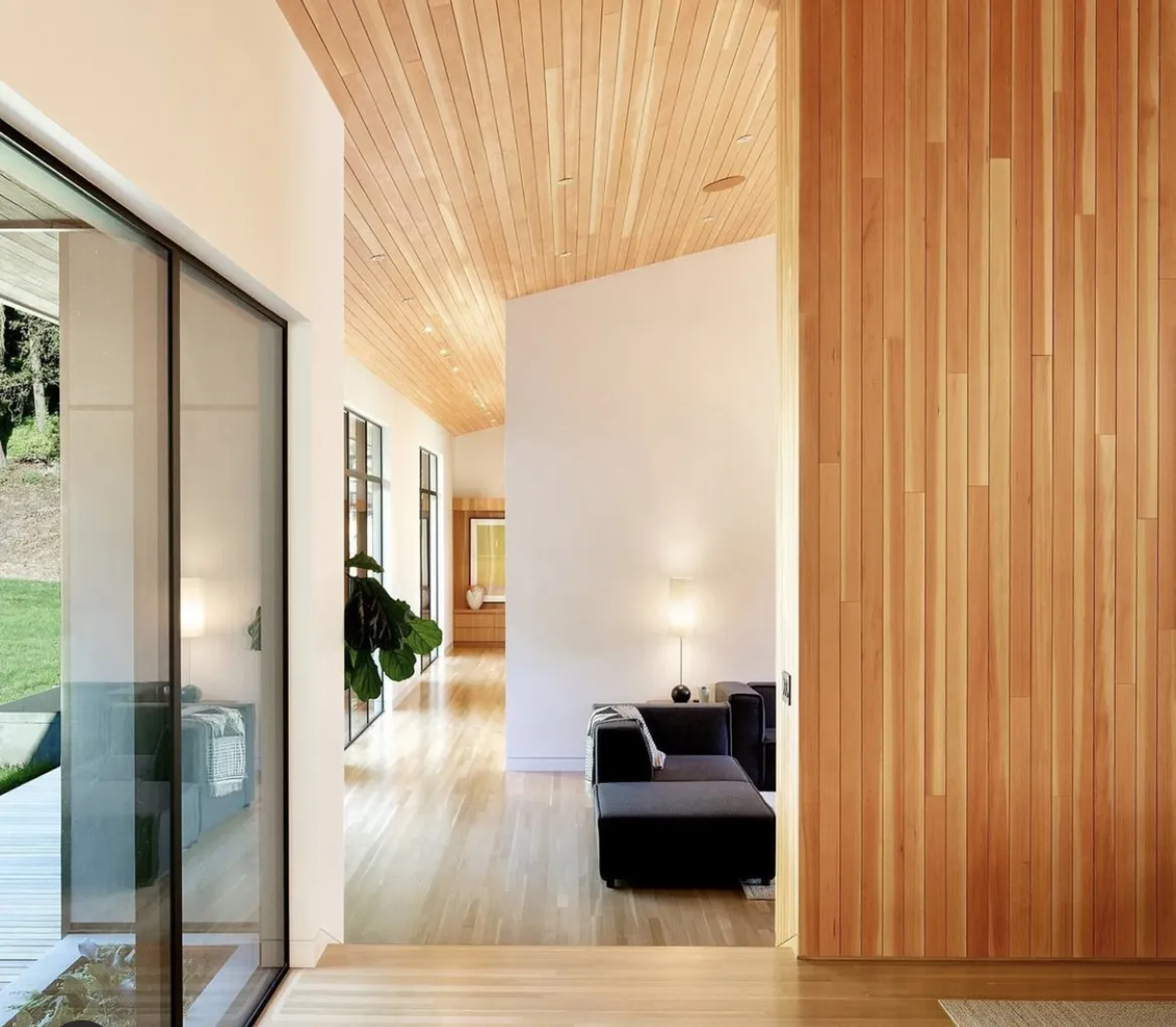 Custom wood entry with integrated architectural lighting