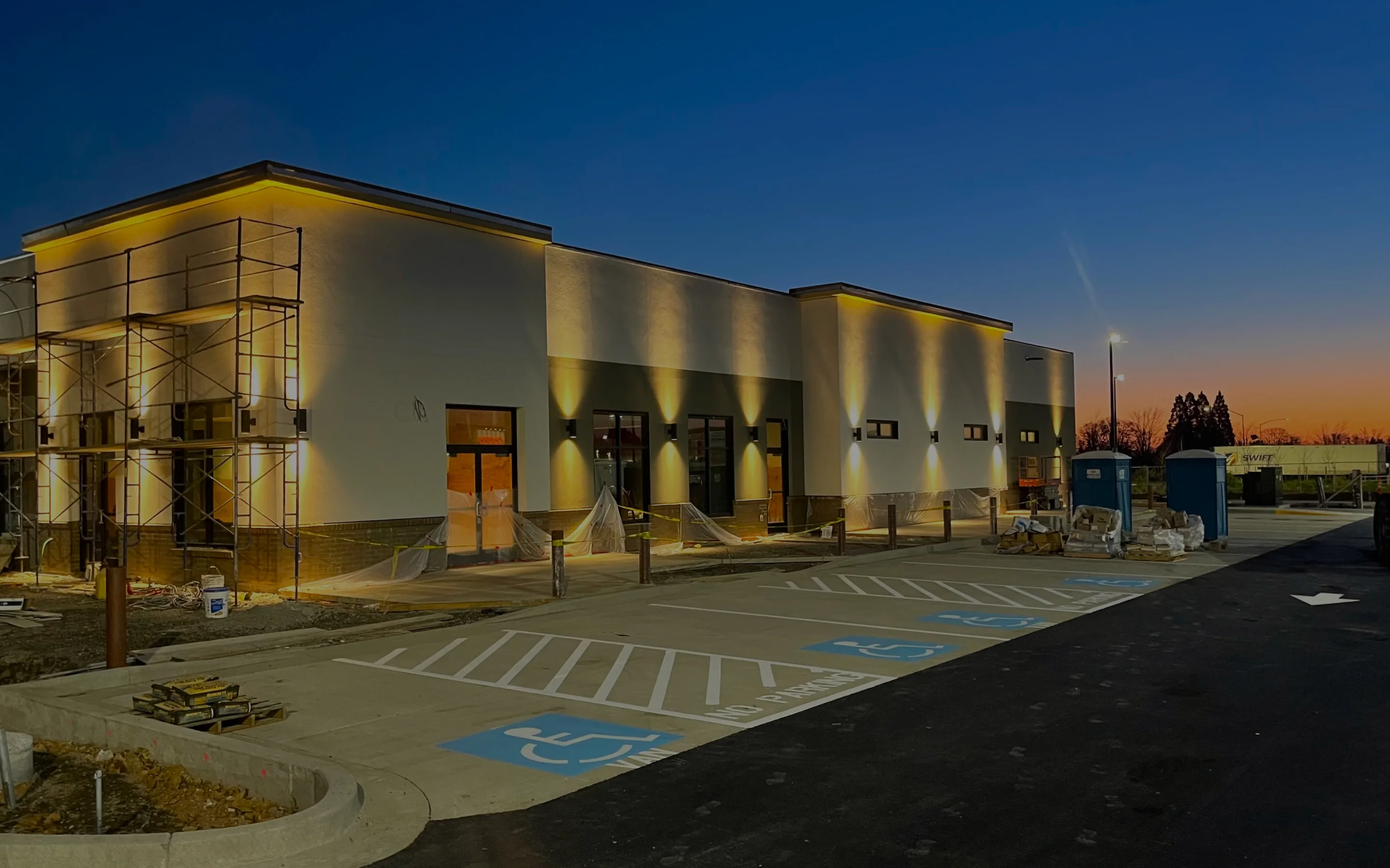 Completed commercial building exterior lighting at night
