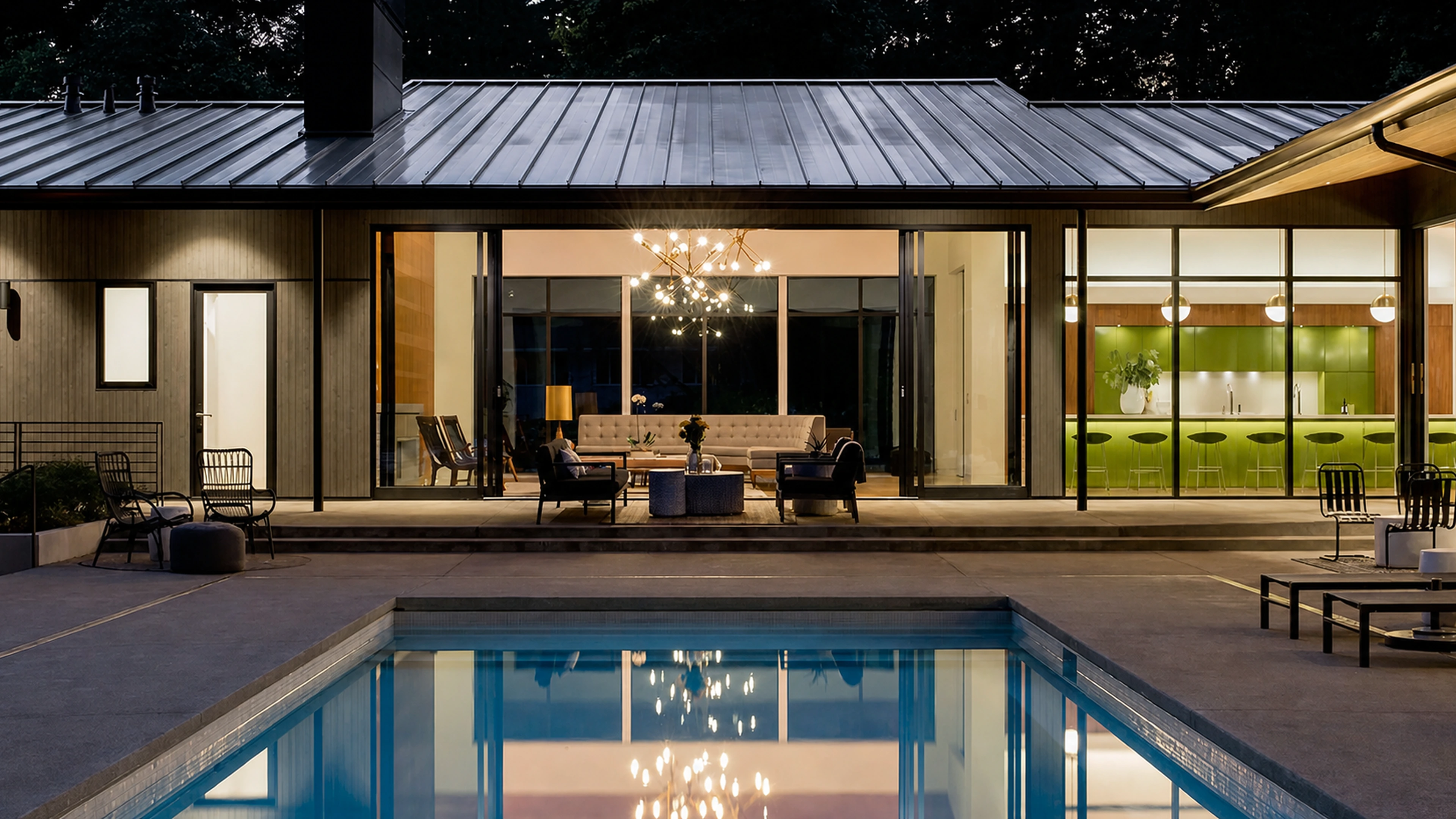 Completed architectural lighting throughout a modern home and pool area