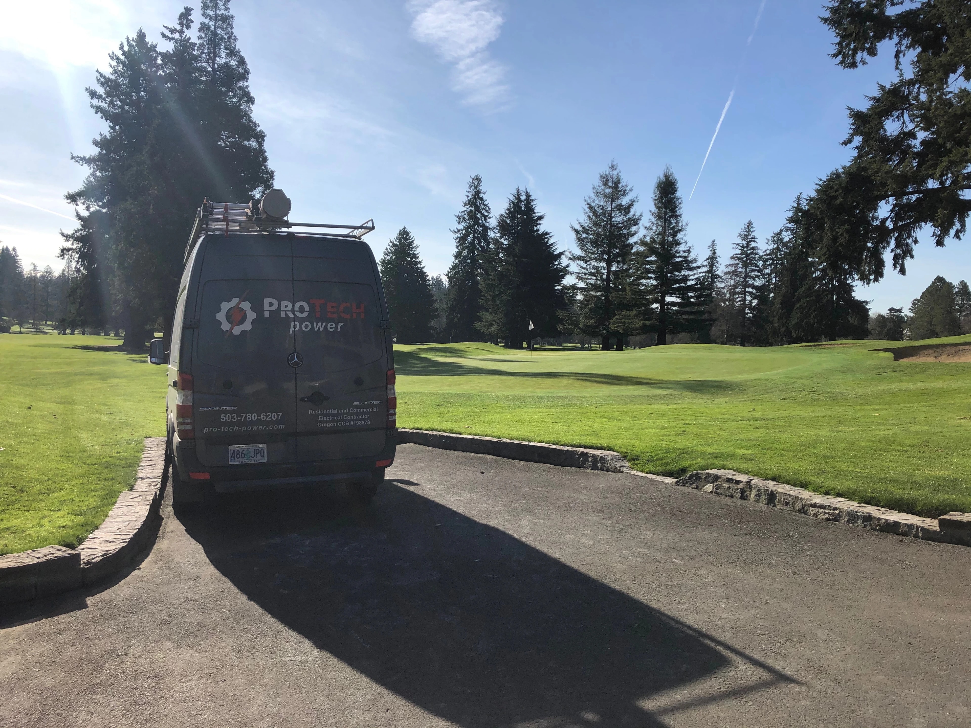 A Pro Tech Power service van equipped and on site at a client project