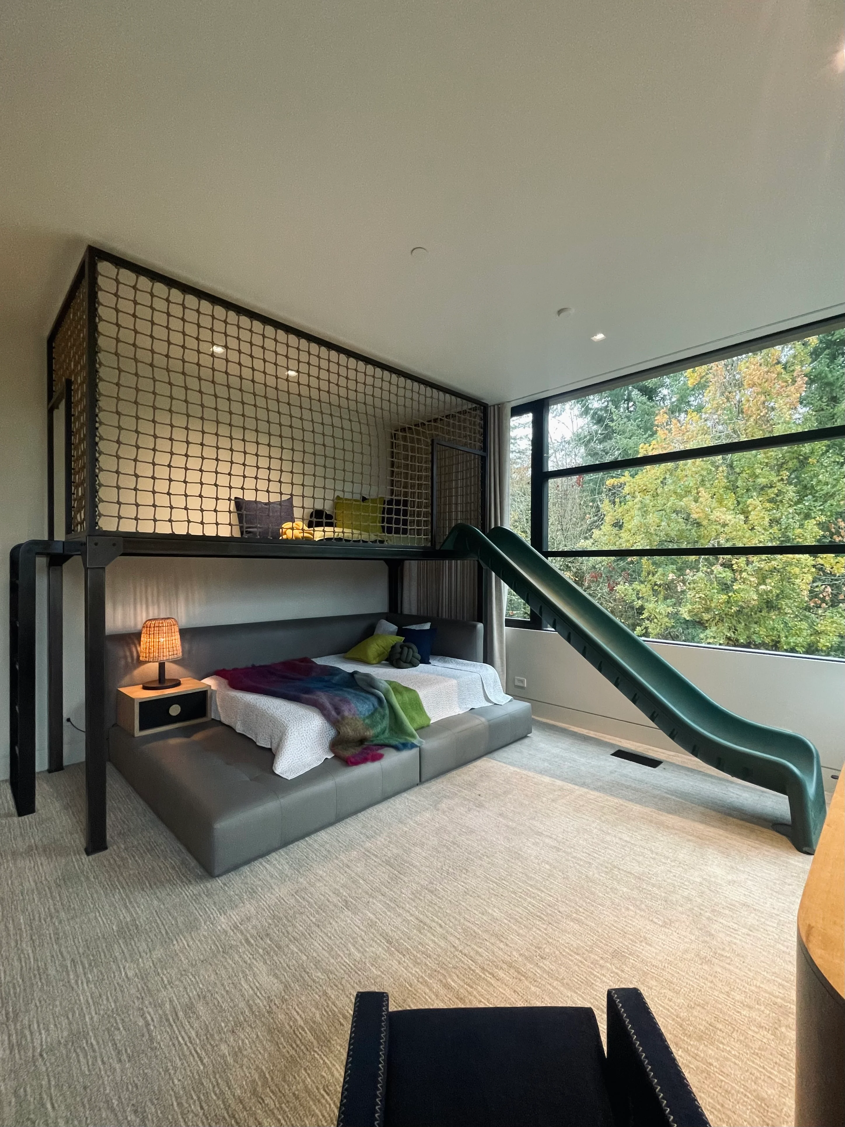 Kids' loft bed and slide lighting