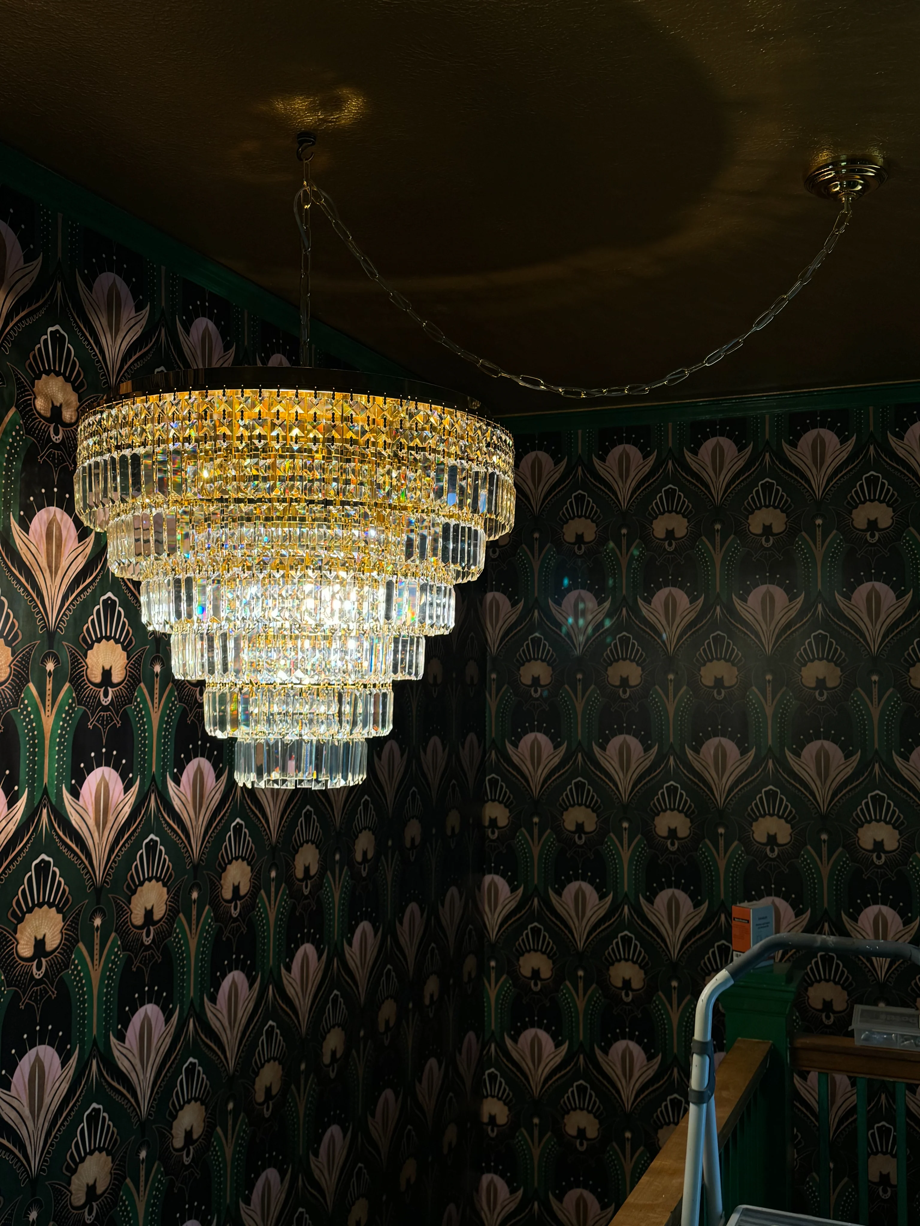 Detailed decorative chandelier installation